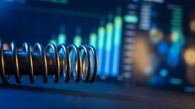 A close-up of a financial trading screen displaying a colorful options chain with glowing strike prices and highlighted open interest columns, bathed in green and blue light suggesting upward momentum.